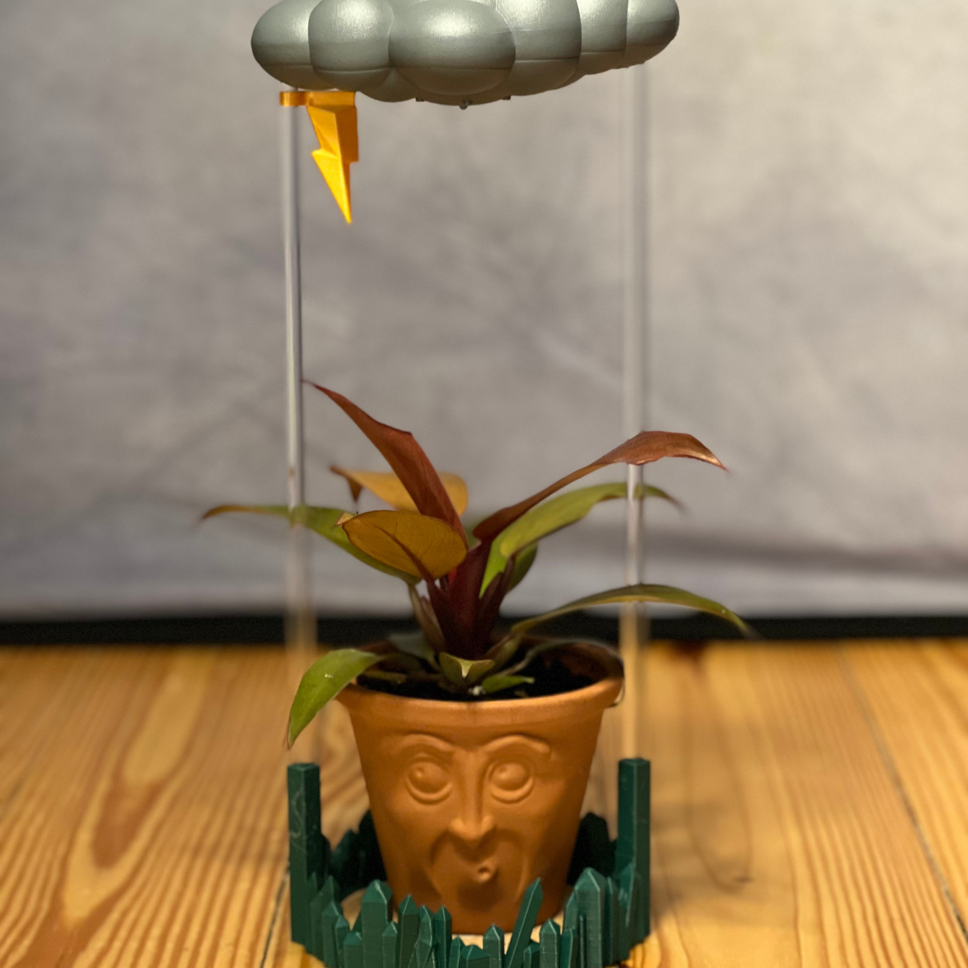 Lightning Bolt Charm for Dripping rain cloud with stormy cloud and green stand and a fun planter