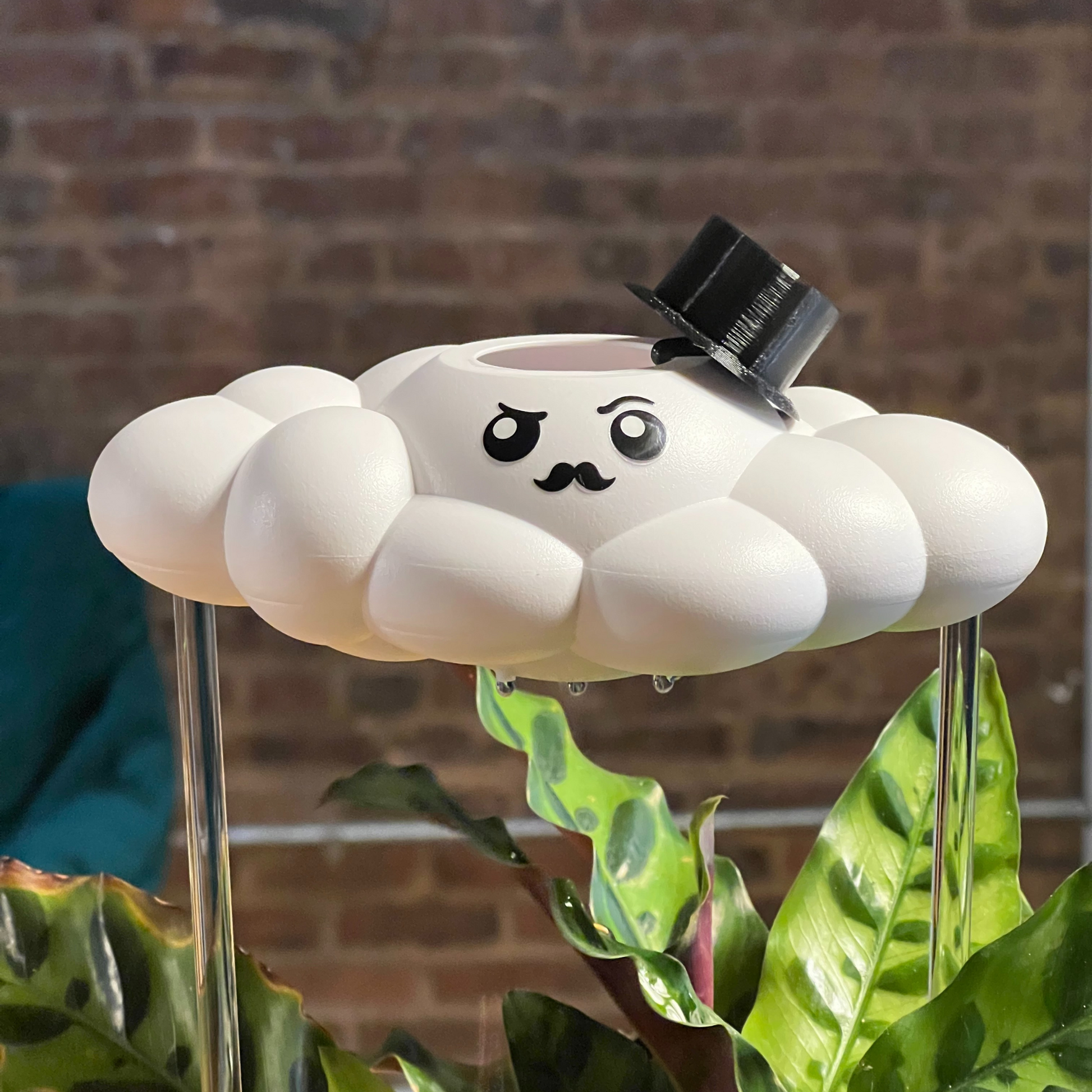 Carl the cloud with top hat charm
