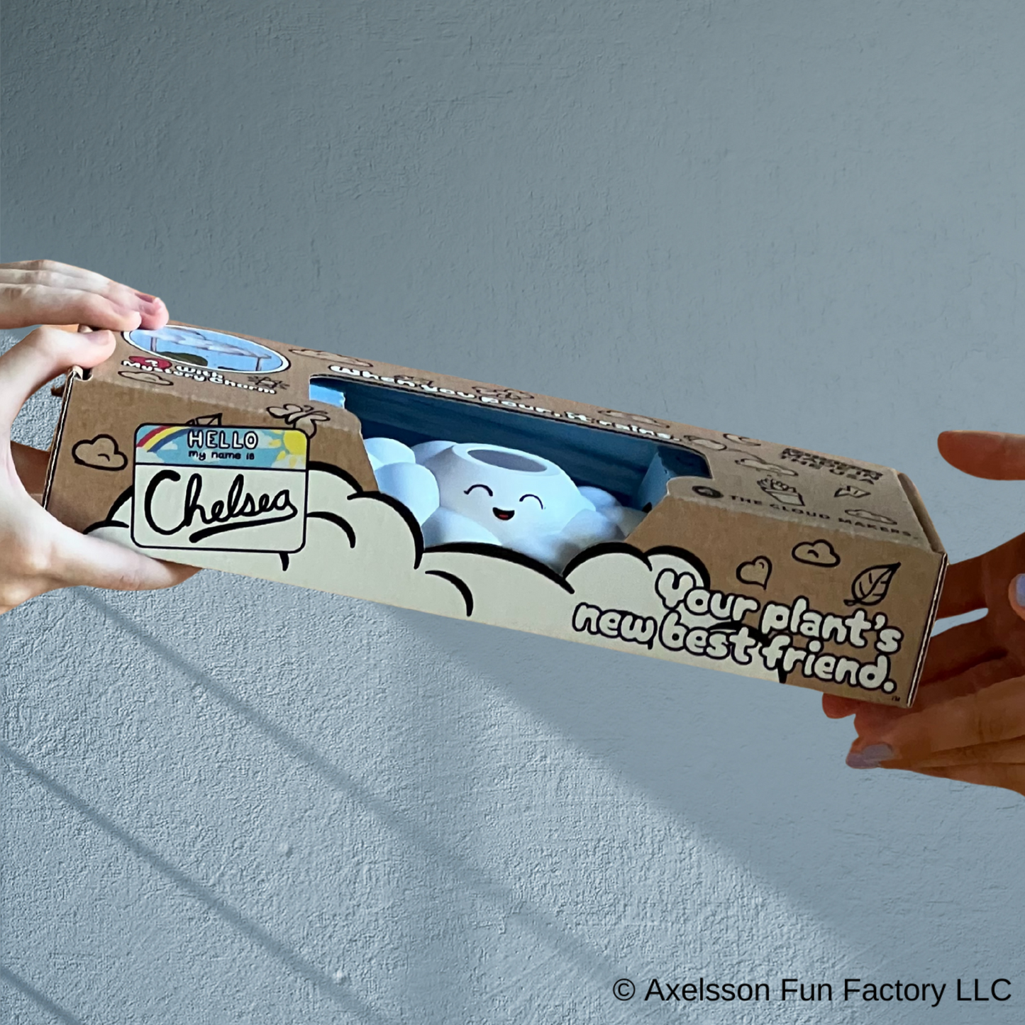 Chelsea the Cloud in packaging on a gray background