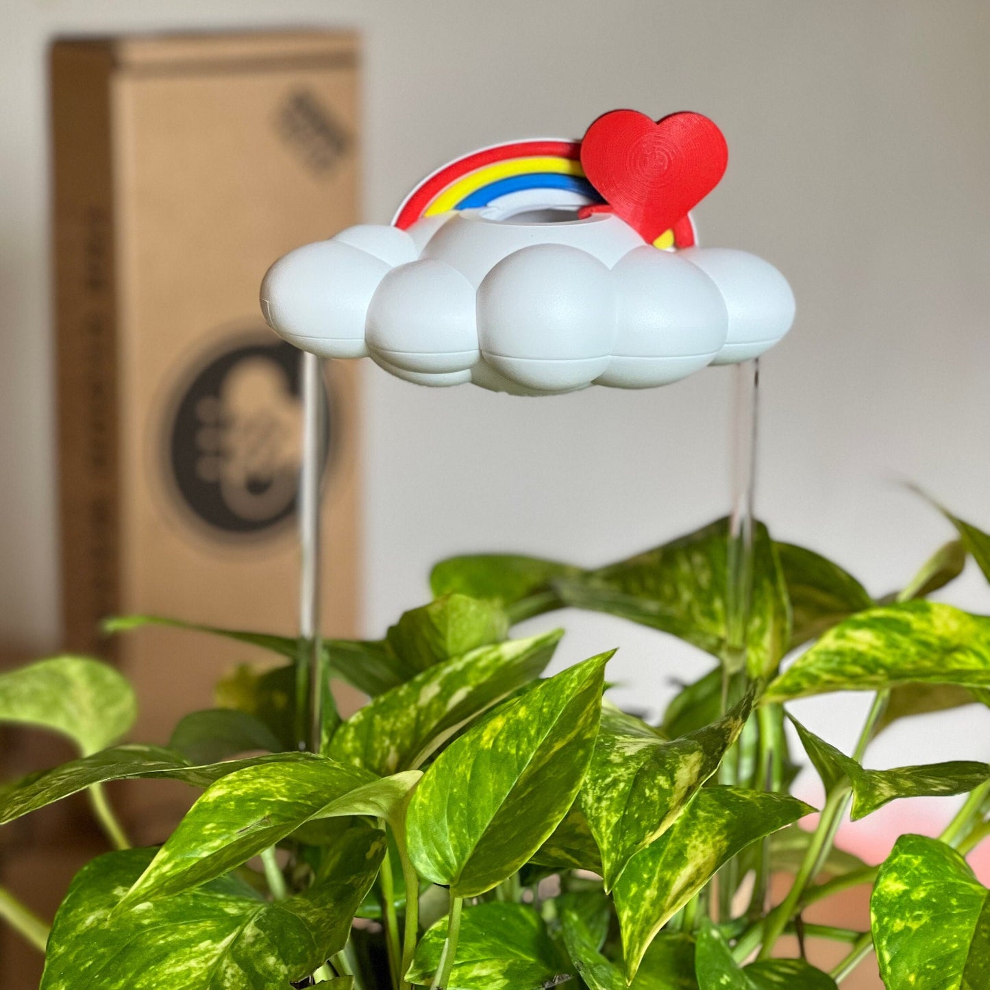 Red heart and rainbow charms for dripping rain cloud
