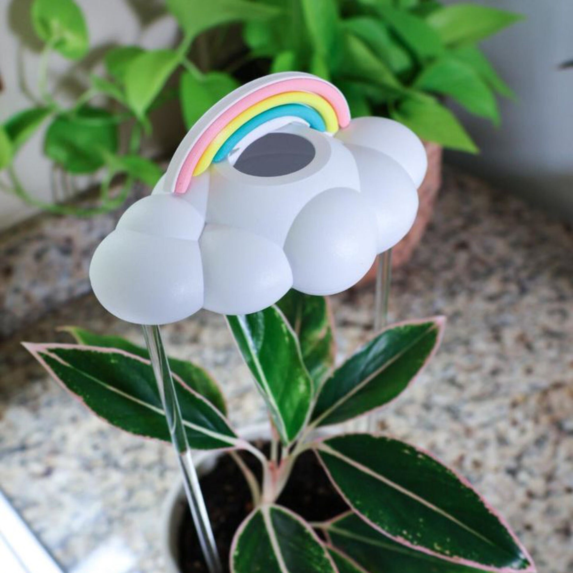 Pastel rainbow charm for dripping rain cloud
