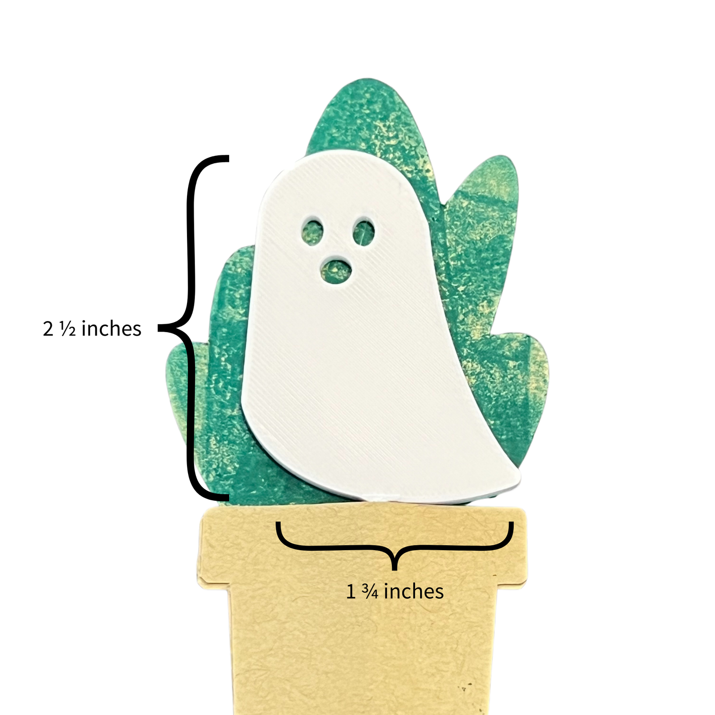 Ghost-shaped Plick with measurements on a white background