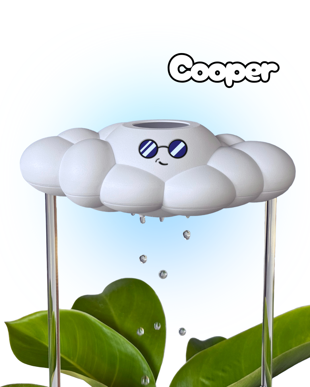 White cloud-shaped watering device with a face, labeled 'Cooper', on a light blue background with green leaves at the bottom.