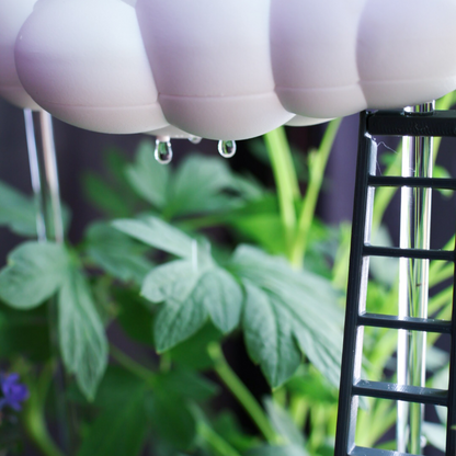 Original dripping rain cloud with ladder charm